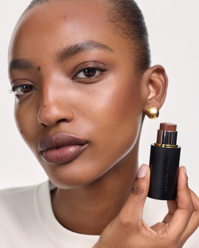 Model wearing Face Trace in Whiskey.
