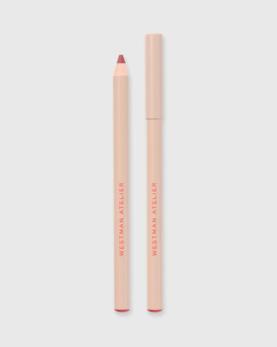 Lip liner in Je Reve on grey background.