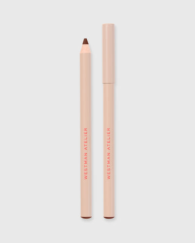 Lip liner in Mink on grey background.